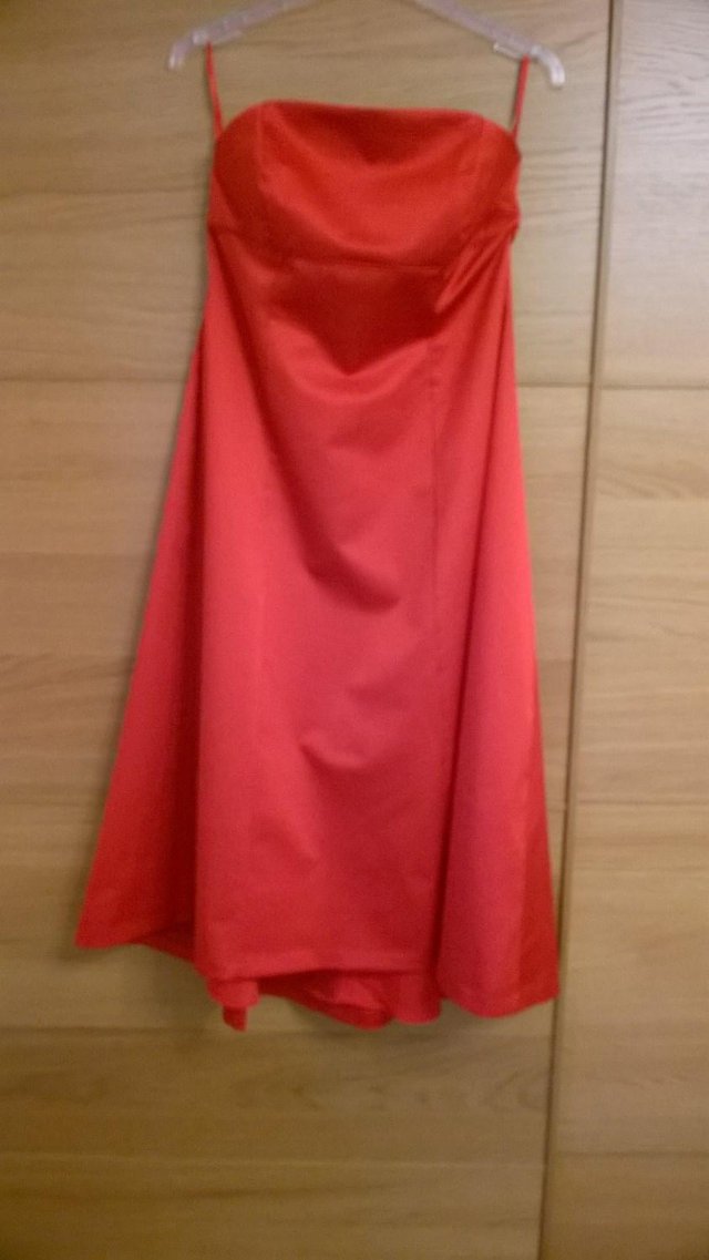 Preview of the first image of Monsoon red satin strapless dress size 12.