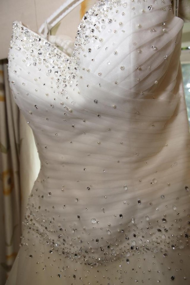 Preview of the first image of Wedding dress - Ivory, size 12.