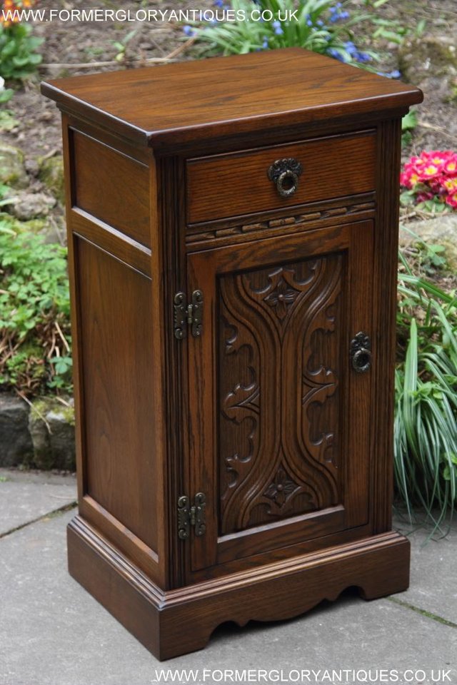 Preview of the first image of AN OLD CHARM LIGHT OAK PEDESTAL CUPBOARD CABINET LAMP TABLE.