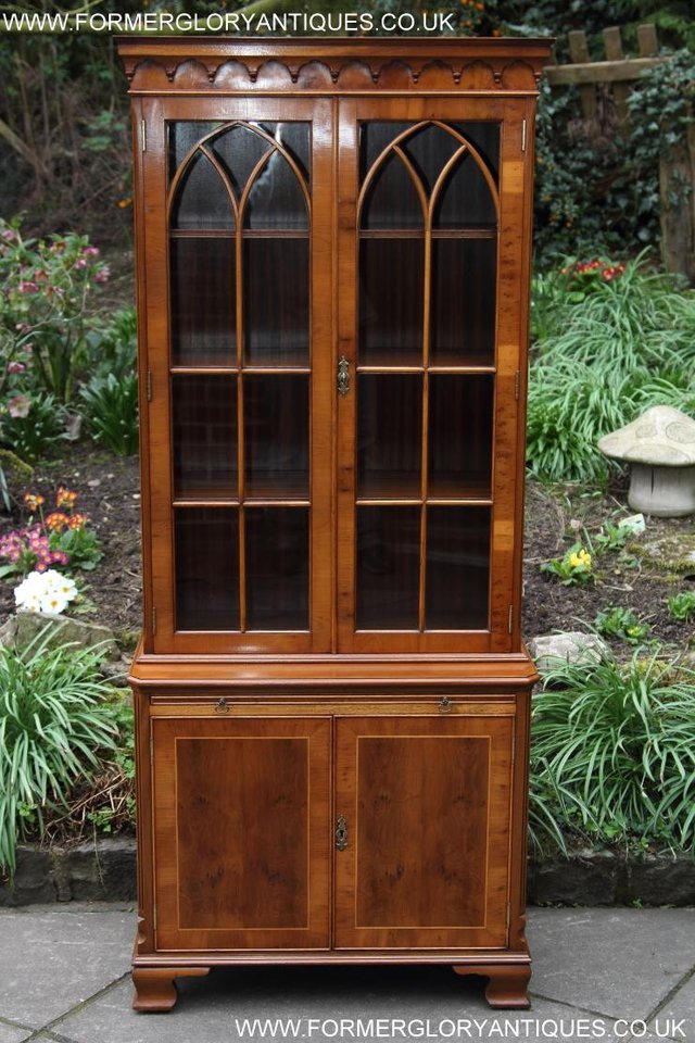 Preview of the first image of A BEVAN FUNNELL YEW BOOKCASE DRINKS DISPLAY CD DVD CABINET.