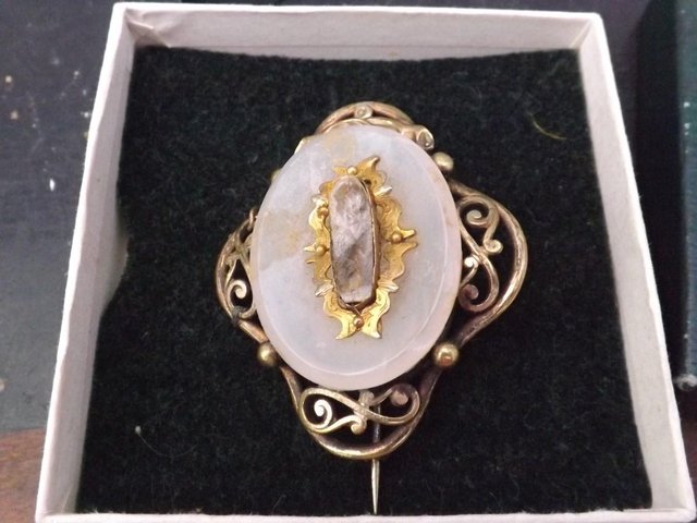 Preview of the first image of Old Victorian lady's brooch.
