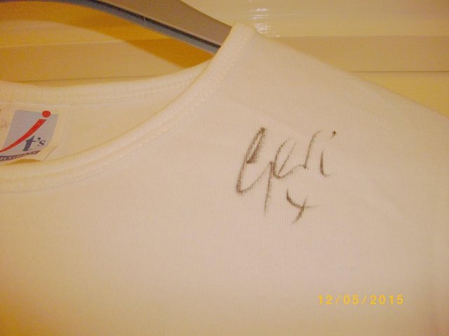 Preview of the first image of SPICE GIRL GERI HALLIWELL Autographed T-Shirt.