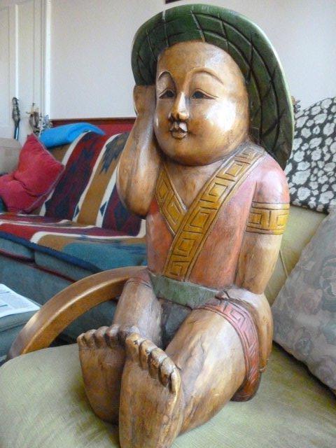 Preview of the first image of Large Carved Wooden Asian Figurine - 50cm tall.