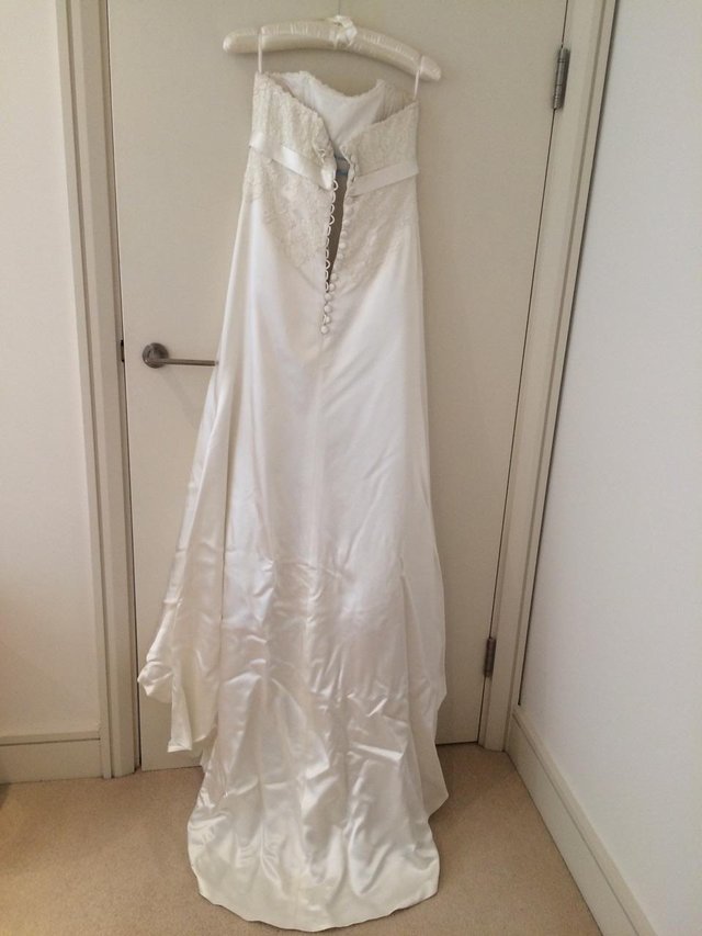 Preview of the first image of Gorgeous Ana Cristache Ivory Satin Wedding Dress for sale.