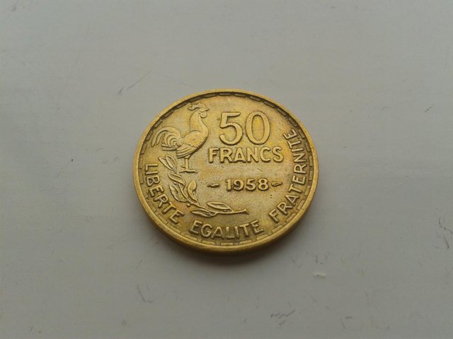 Preview of the first image of 1958 France 50 Francs Coin KM# 918.1 (Unc).