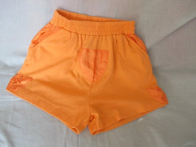 Preview of the first image of BRIGHT ORANGE SHORTS.