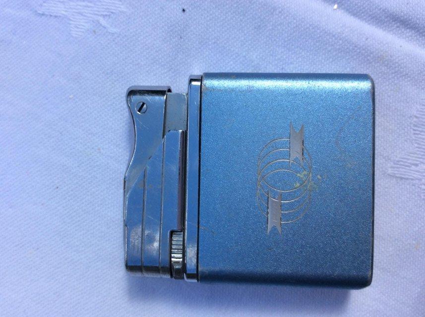 Preview of the first image of Vintage Roland cigarette lighter.