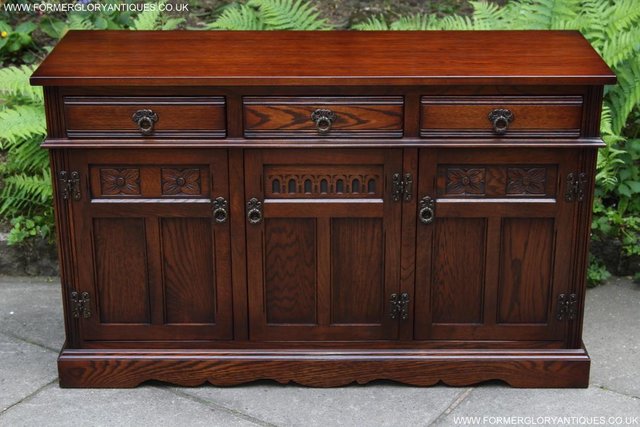 Preview of the first image of AN OLD CHARM TUDOR OAK DRESSER BASE SIDEBOARD CABINET TABLE.