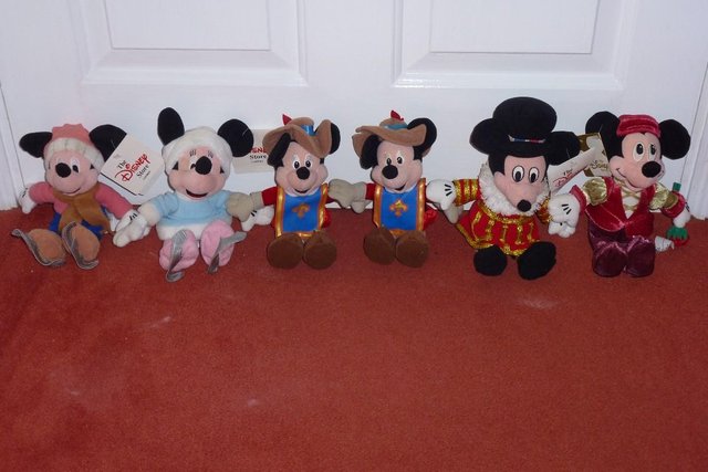 Preview of the first image of Various Beanie Babies including Mickey, Minnie and Pooh.