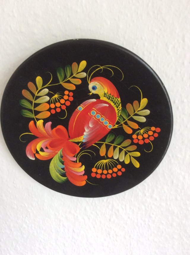 Preview of the first image of Wooden black painted decorative plate.