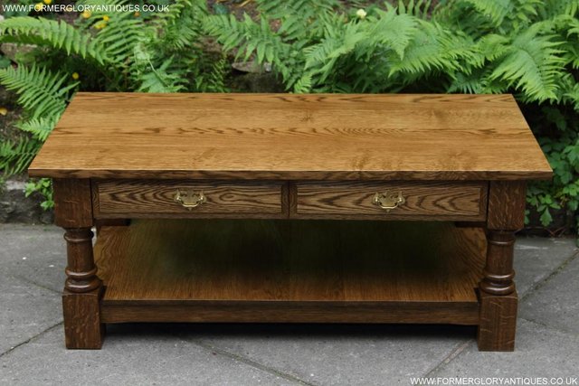 Preview of the first image of A TITCHMARSH GOODWIN STYLE TWO DRAWER COFFEE TABLE STAND.