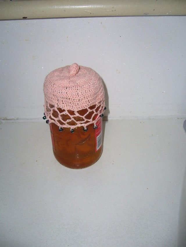 Preview of the first image of Crocheted jam pot covers - two.