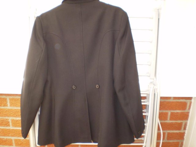 Preview of the first image of BLACK SHOW JACKET 42" - AS NEW.