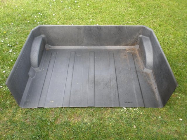 Preview of the first image of Fibreglass/ plastic boot liner for estate car.