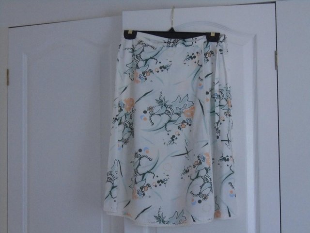 Preview of the first image of Ladies White Stuff Wrap Around Skirt.