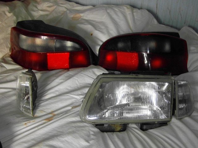 Preview of the first image of Citroen Saxofront headlight rear light pods and other item.