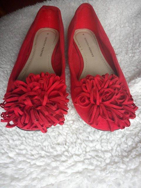 Preview of the first image of Red Suede pumps size 4.