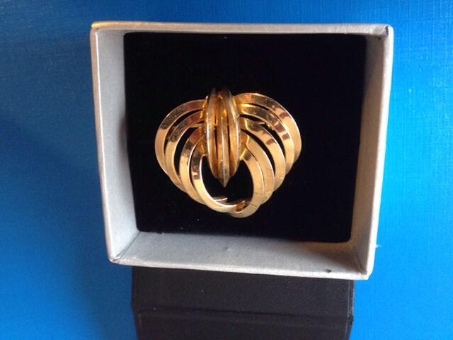 Preview of the first image of Gold plated brooch.