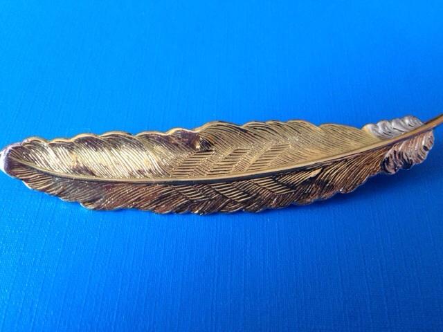 Preview of the first image of New Gold plated feather brooch.