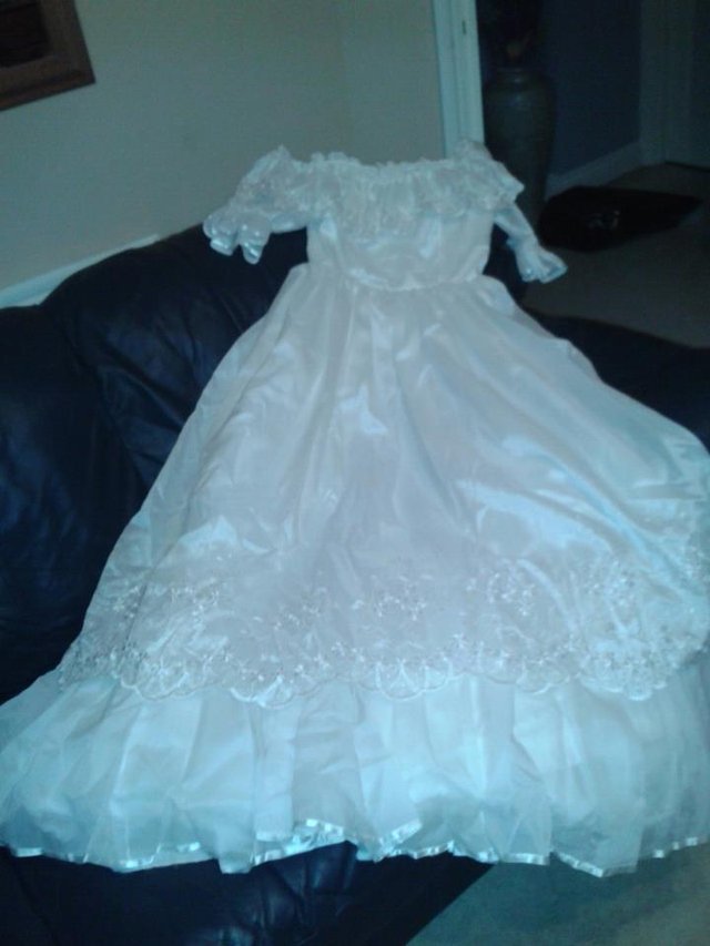 Preview of the first image of Wedding Dress worn once and cleaned.