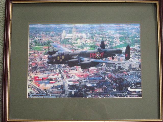 Preview of the first image of Framed Print - City of Lincoln - Lancaster Bomber.