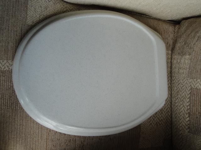 Preview of the first image of New Greyish White Plastic Toilet Seat.