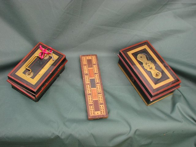Preview of the first image of ANTIQUE MONEY BOXES AND CRIBBAGE BOARD.