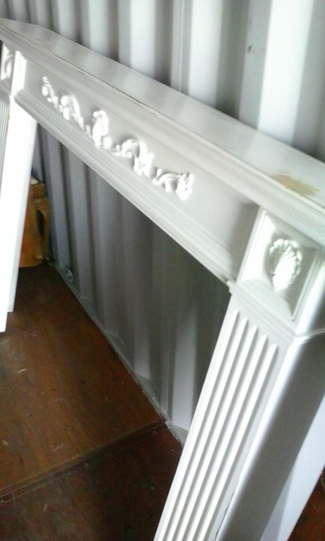 Preview of the first image of PAIR OF FIRE SURROUNDS.