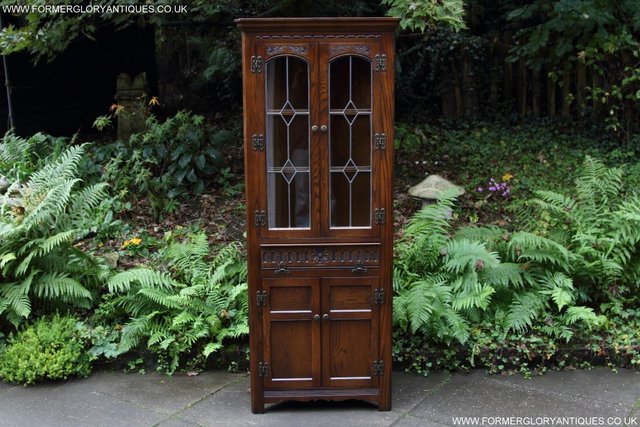 Preview of the first image of OLD CHARM JAYCEE LIGHT OAK CORNER DISPLAY CHINA CABINET.