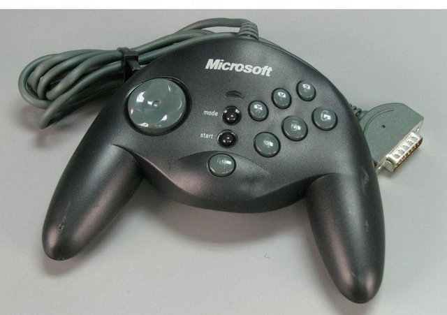 Preview of the first image of Microsoft Sidewinder PC Game Pad - Boxed.