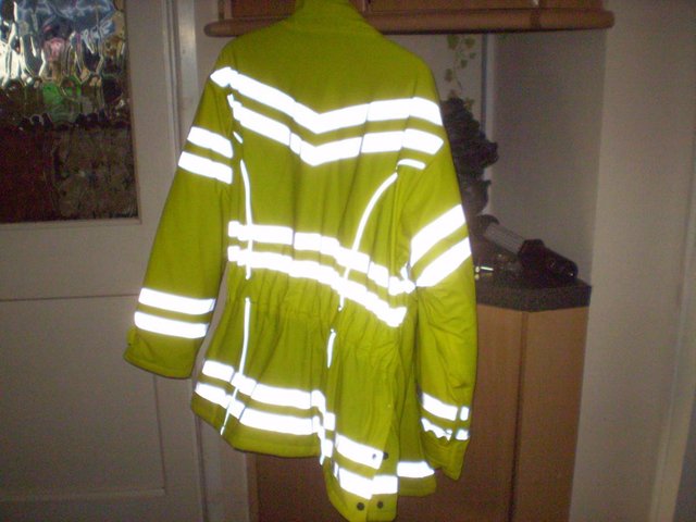 Preview of the first image of HI-VIZ FLEECE LINED RIDING JACKET. SIZE 18.