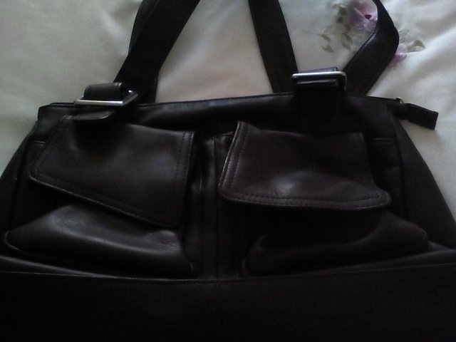 Preview of the first image of Leather hand bag.