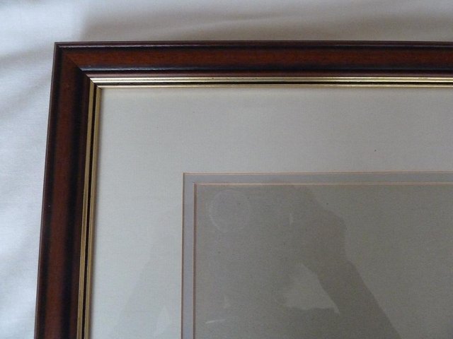 Preview of the first image of Attractive Hardwood picture frame.