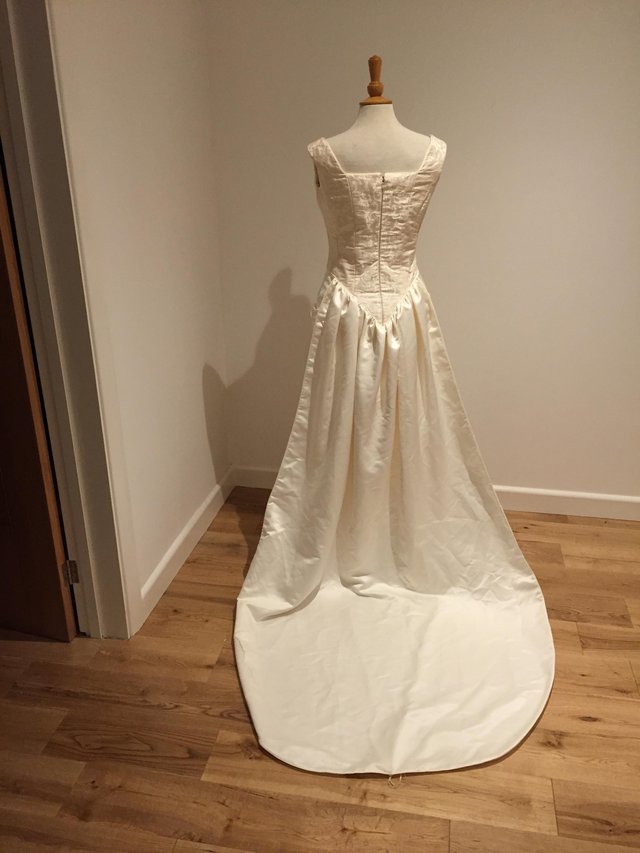 Preview of the first image of Stunning column wedding dress Ivory with train size 12.