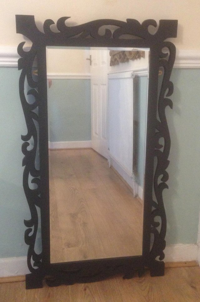 Preview of the first image of Solid wood Lovely Black Matt Intricately Carved Frame Mirror.