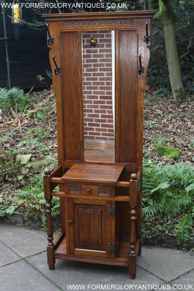 Preview of the first image of AN OLD CHARM JAYCEE LIGHT OAK HALL COAT STICK STAND CABINET.