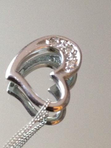 Image 2 of Diamonds in 9ct White gold heart shape pendant.