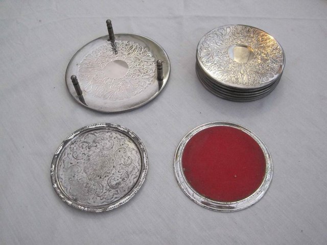 Preview of the first image of 1950-70s SILVER ? /PLATED coaster stand with coasters.