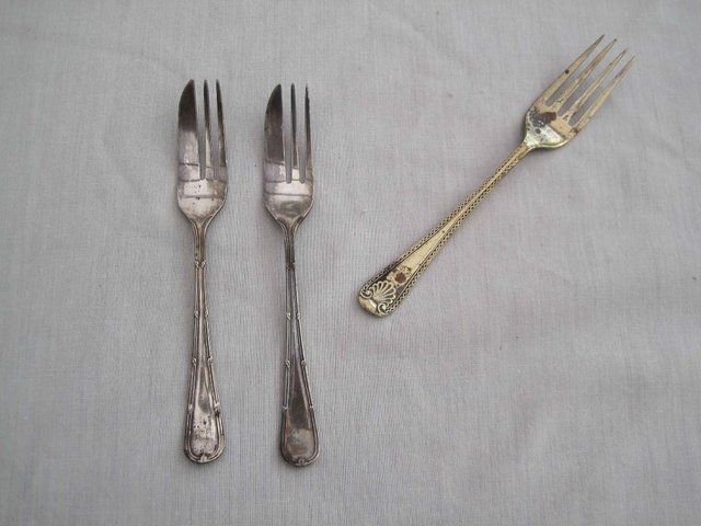 Preview of the first image of 3 1950s SILVER? /PLATED fish / forks.