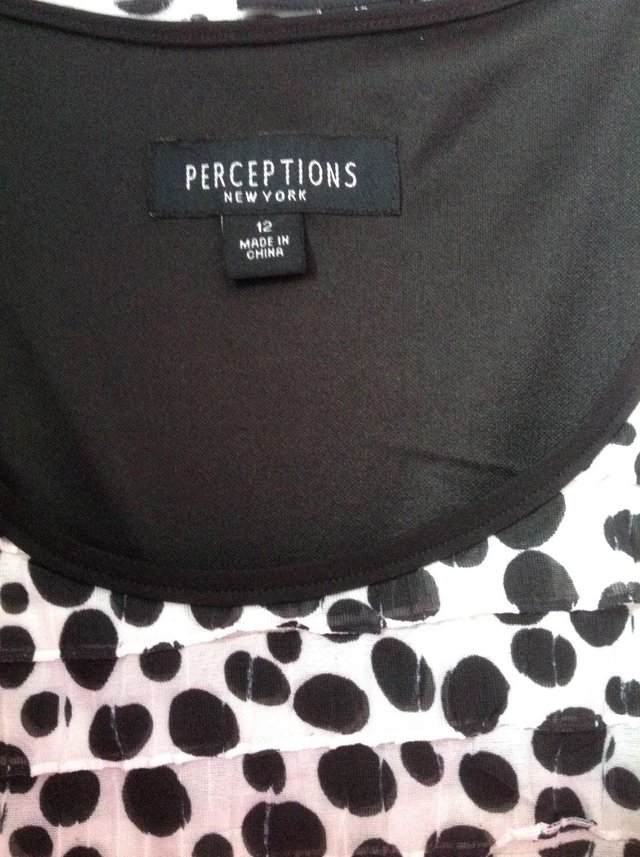Preview of the first image of Perceptions New York Flattering Dress with matching jacket.