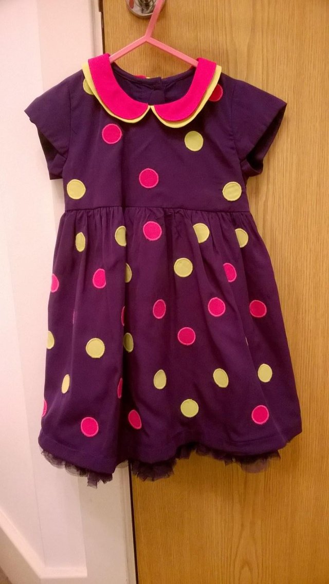 Preview of the first image of Girls M&S dress size 12-18 months.