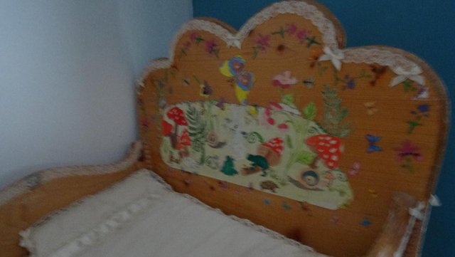 Image 2 of Handcrafted Pine Crib with Victorian craft decoration.
