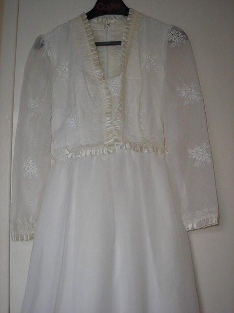 Preview of the first image of Wedding Dress - white with long sleeves.