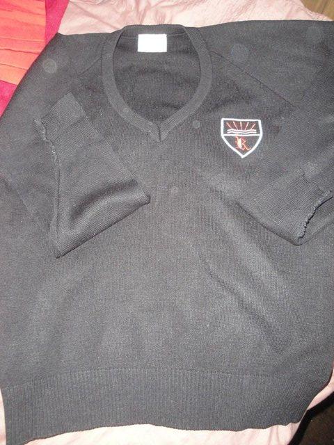 Preview of the first image of Redborne School black V-neck jumper. Size 40. Used..