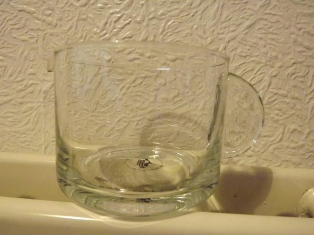 Preview of the first image of Habitat handmade glass jug.
