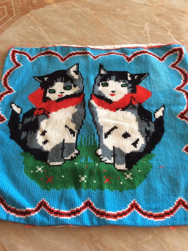 Preview of the first image of Embroidered cushion cover with two cats.