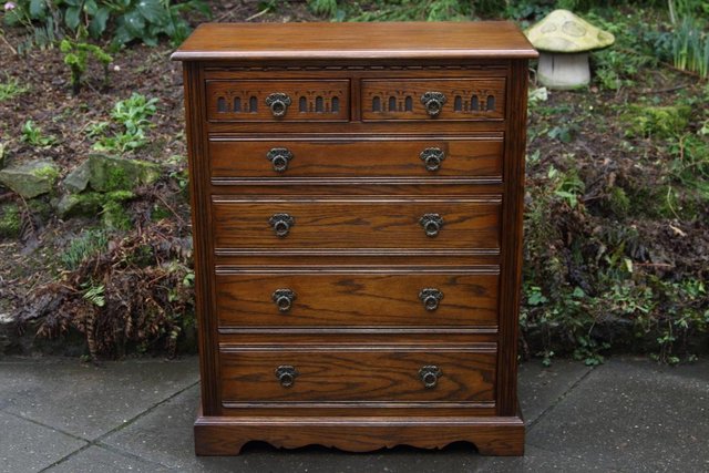 Preview of the first image of OLD CHARM JAYCEE LIGHT OAK TALL BOY CHEST OF DRAWERS STAND.