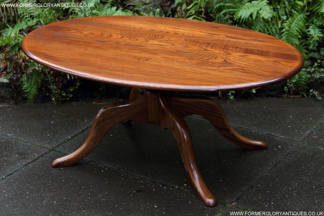 Preview of the first image of ERCOL ELM OVAL SIDE LAMP PHONE TEA WINE COFFEE TABLE STAND.