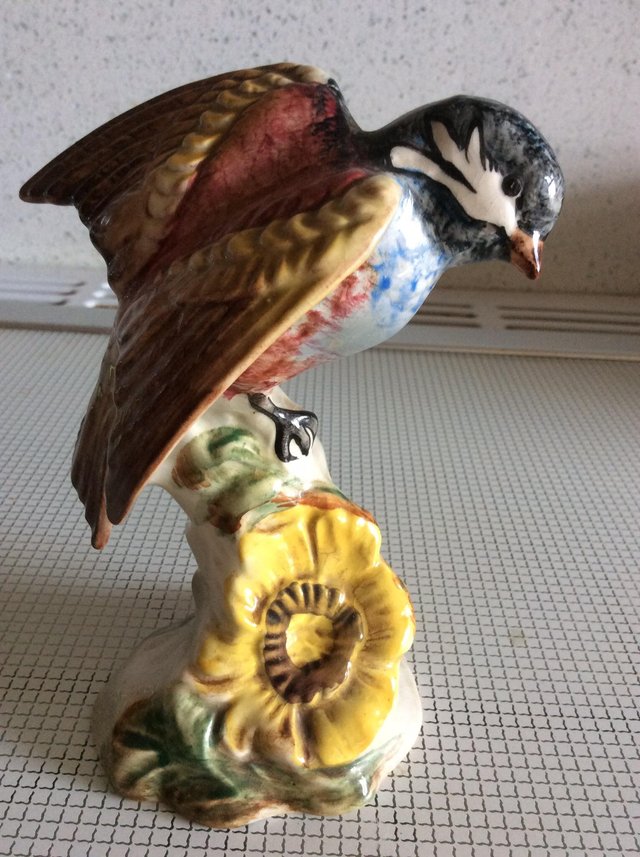 Preview of the first image of BeswickChickadee bird figurine.
