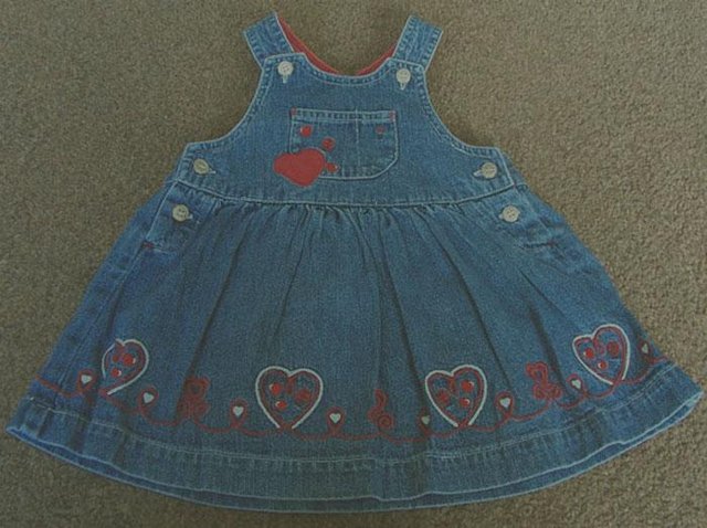 Preview of the first image of BEAUTIFUL BABIES DENIM DRESS WITH HEART DETAIL - AGE 3/6M.